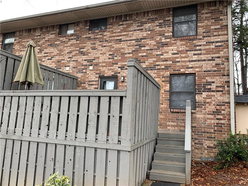 1235 Riverside Drive, Unit H1 Gainesville, GA 30501 - Photo 5 of 19 a view of a pathway of the house