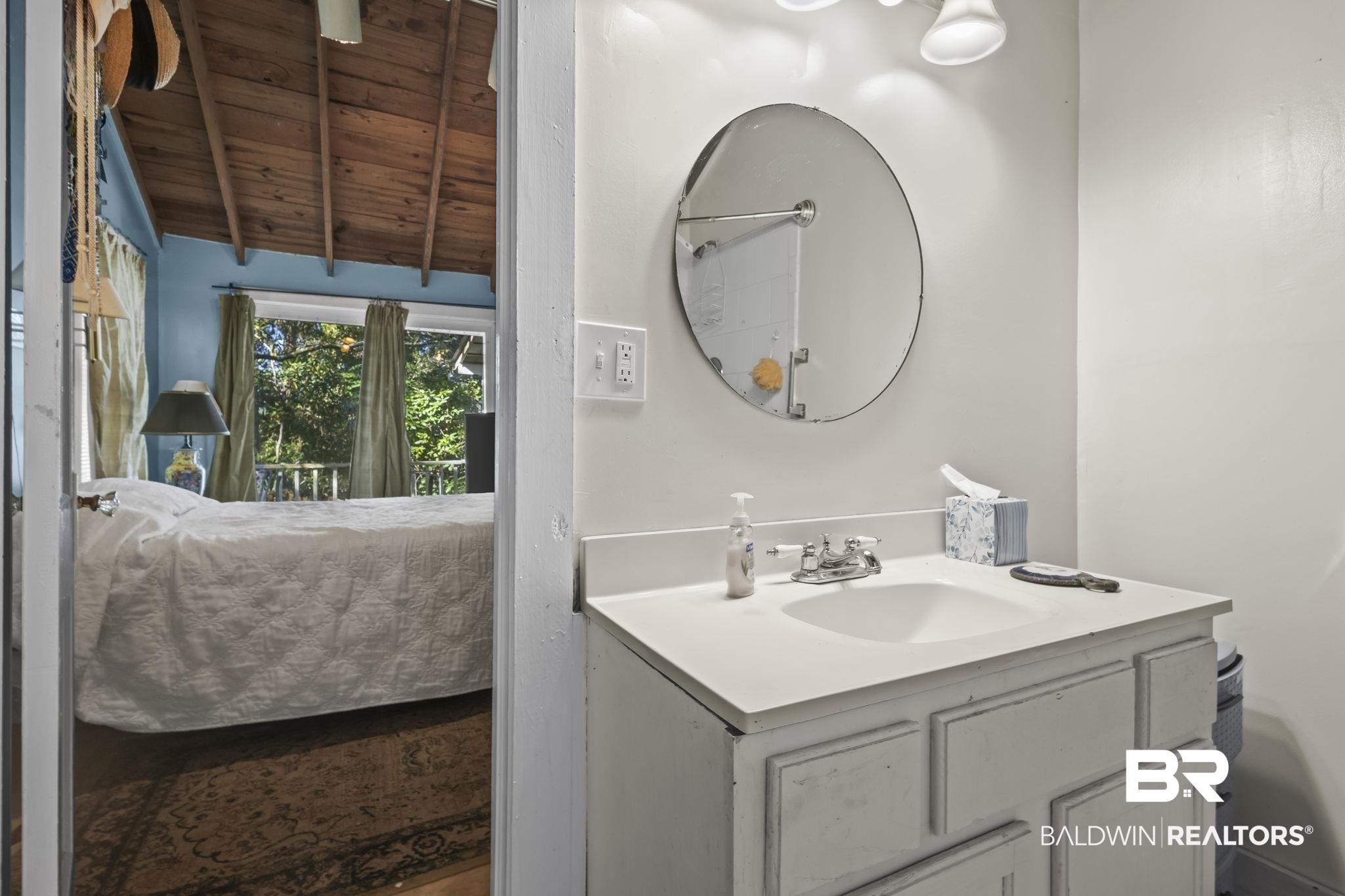 18696 Borck Road Gulf Shores, AL 36542 - Photo 18 of 47 Bathroom with vanity, vaulted ceiling with beams, and wooden ceiling