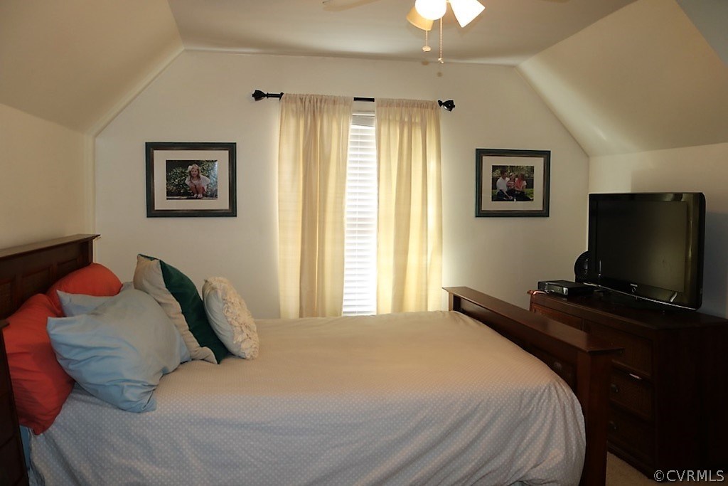 7211 Full Rack Drive Midlothian, VA 23112 - Photo 13 of 22 a bedroom with a bed and a flat screen tv