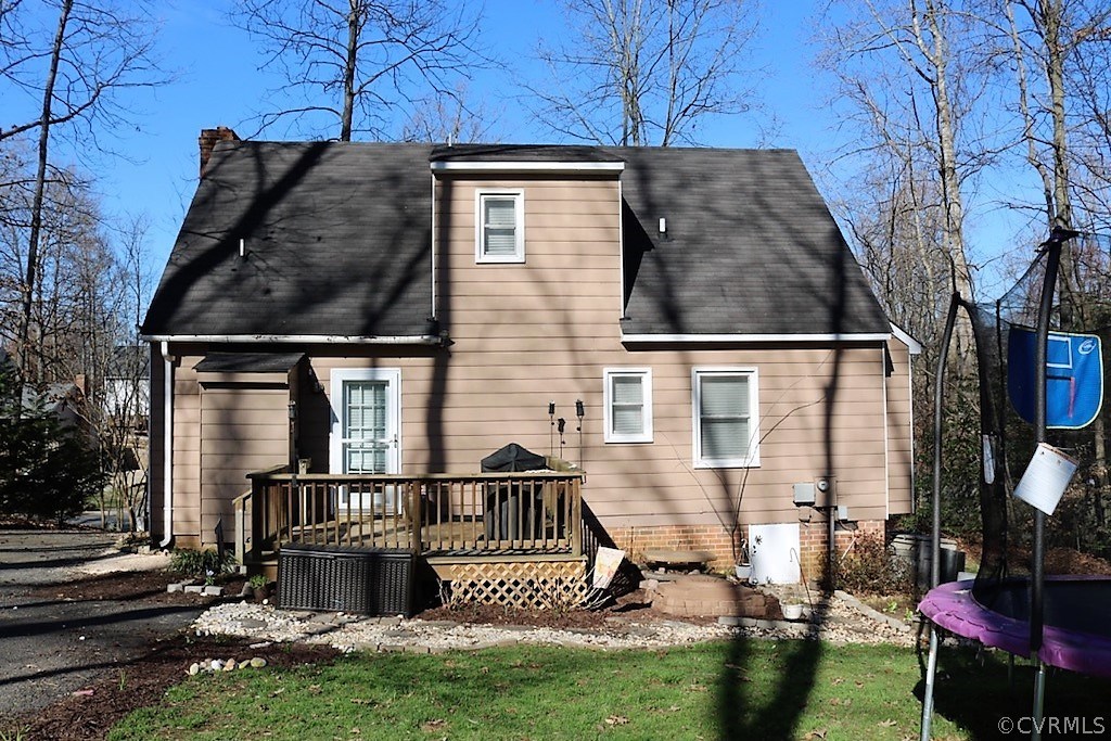 7211 Full Rack Drive Midlothian, VA 23112 - Photo 17 of 22 a view of a house with wooden deck and a yard