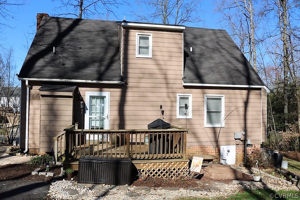 7211 Full Rack Drive Midlothian, VA 23112 - Photo 18 of 22 a view of a brick house with wooden fence