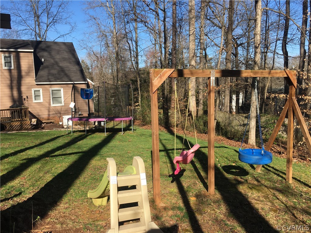 7211 Full Rack Drive Midlothian, VA 23112 - Photo 20 of 22 a view of a house with a yard and furniture