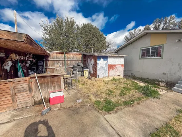 a bedroom with furniture and a bed