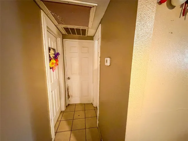 a bathroom with a granite countertop sink a toilet and bathtub