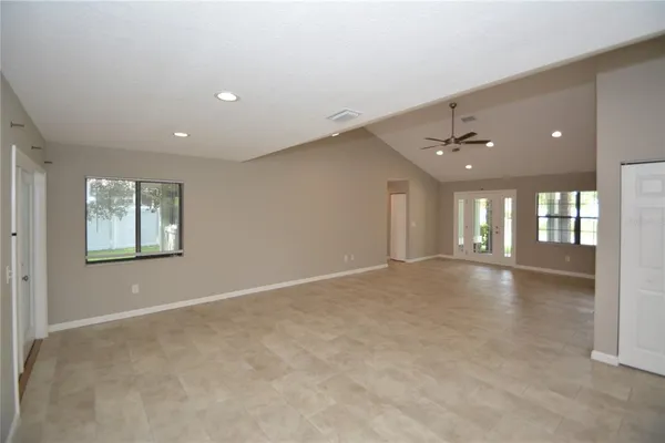a view of an empty room with a window