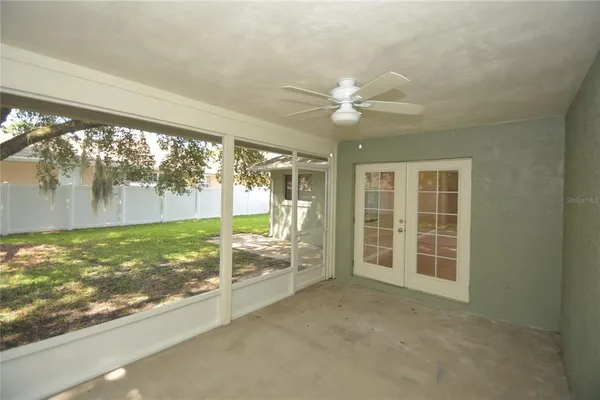 a view of an empty room with window