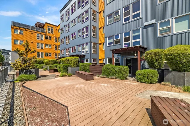 a front view of a building with garden