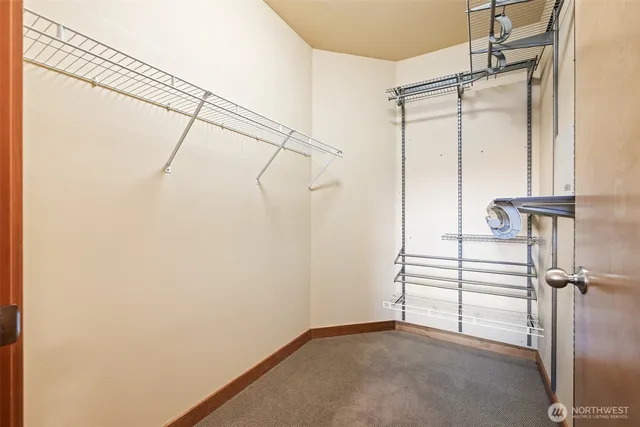 a view of a room with racks on the wall