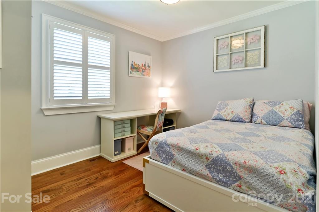 1901 Truman Road Charlotte, NC 28205 - Photo 20 of 39 a bedroom with a bed and a window
