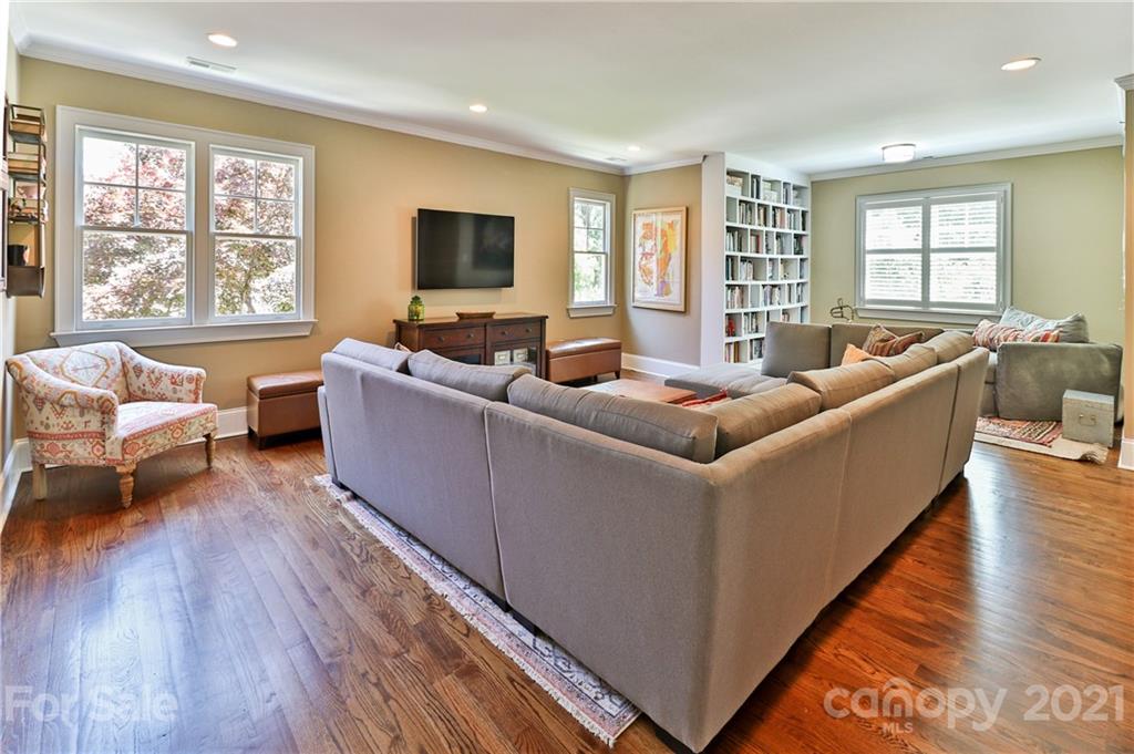 1901 Truman Road Charlotte, NC 28205 - Photo 23 of 39 a living room with furniture and a flat screen tv