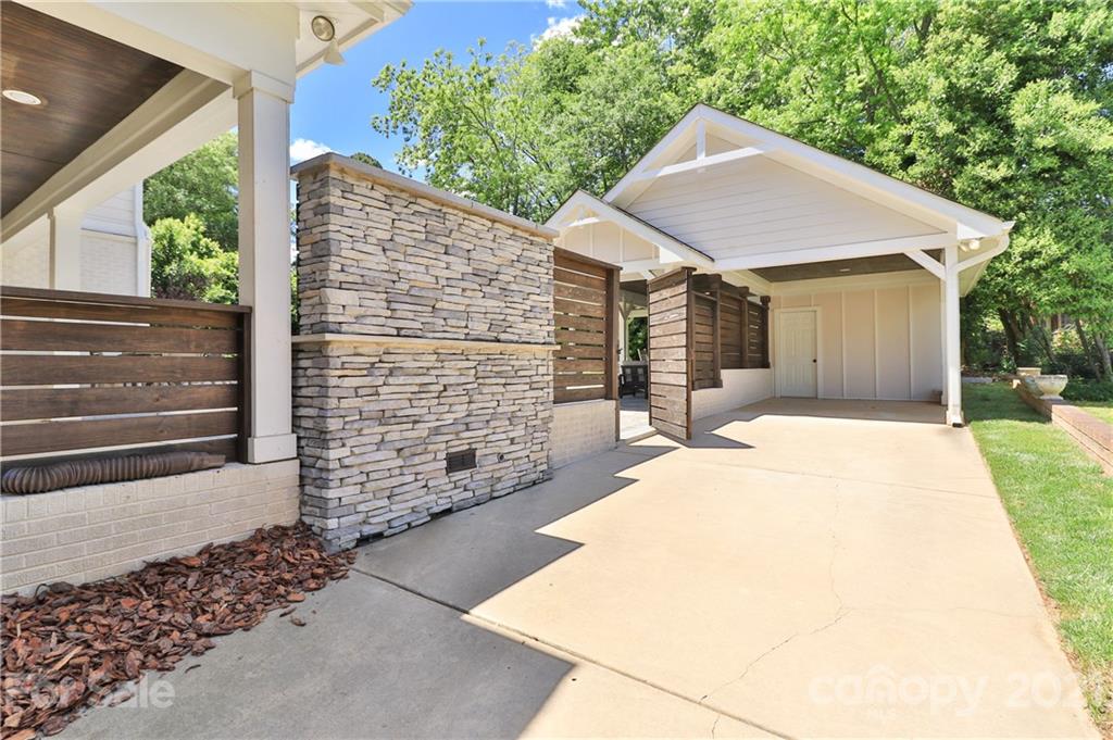 1901 Truman Road Charlotte, NC 28205 - Photo 37 of 39 a backyard of a house with yard and outdoor seating