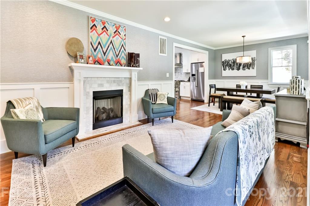1901 Truman Road Charlotte, NC 28205 - Photo 7 of 39 a living room with furniture and a fireplace