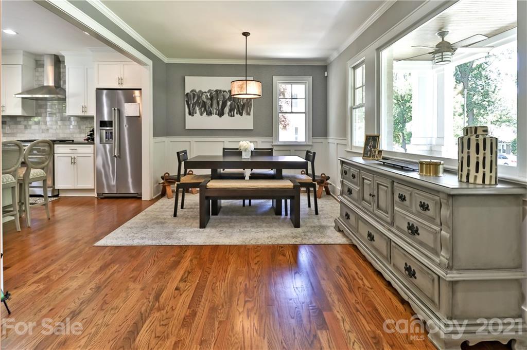 1901 Truman Road Charlotte, NC 28205 - Photo 10 of 39 a living room with stainless steel appliances granite countertop a stove top oven and a wooden floors