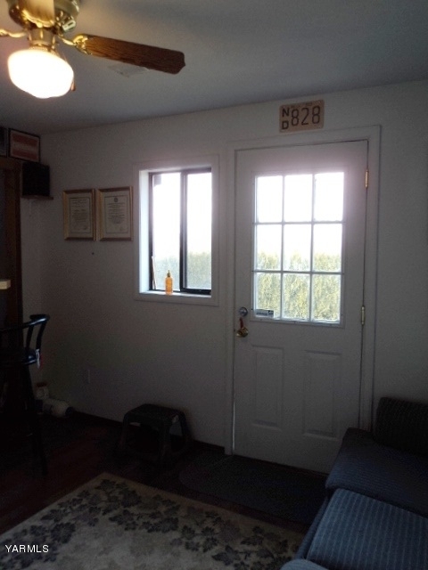 6701 East Beauchene Road Moxee, WA 98936 - Photo 17 of 27 a living room with furniture and a window