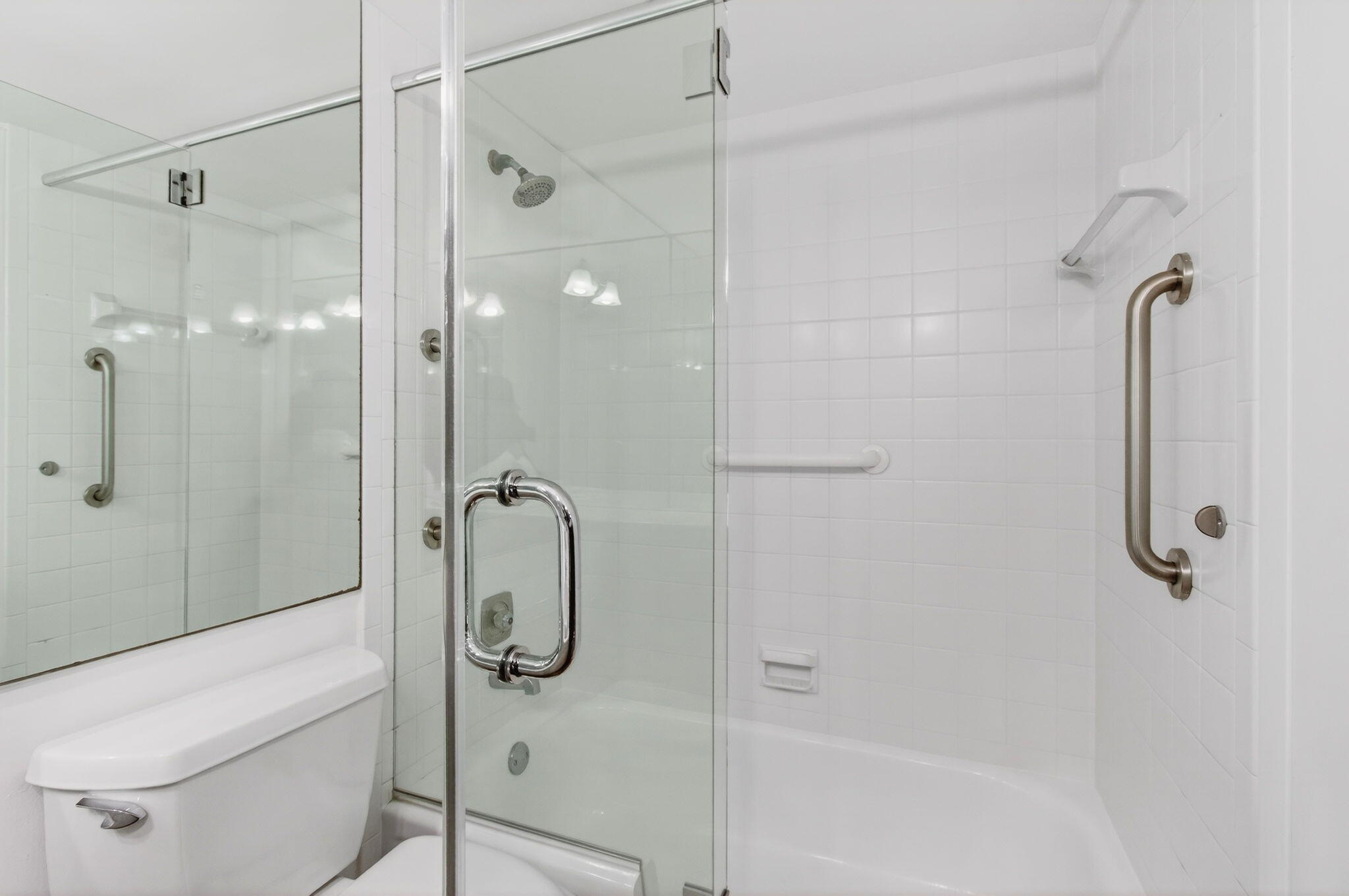 359 Brighton I Boca Raton, FL 33434 - Photo 19 of 34 a bathroom with a shower and toilet
