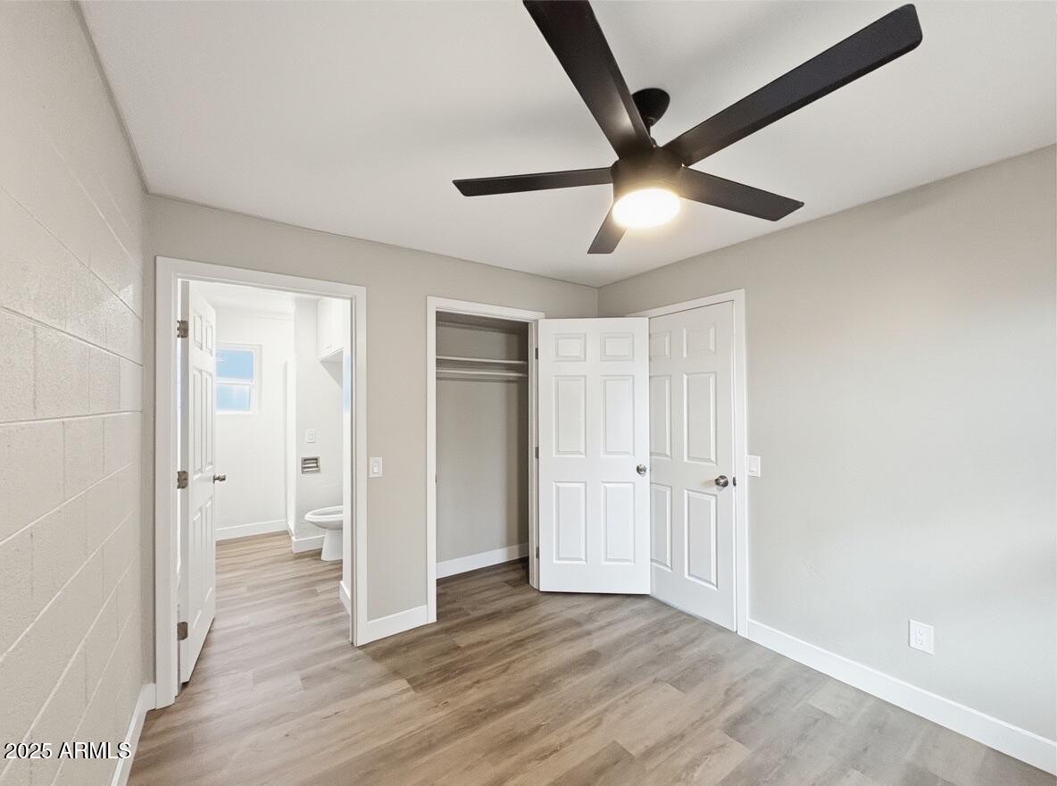 513 East Hatcher Road, Unit 7 Phoenix, AZ 85020 - Photo 5 of 7 a view of empty room with wooden floor