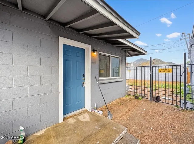 a view of a backyard of a house