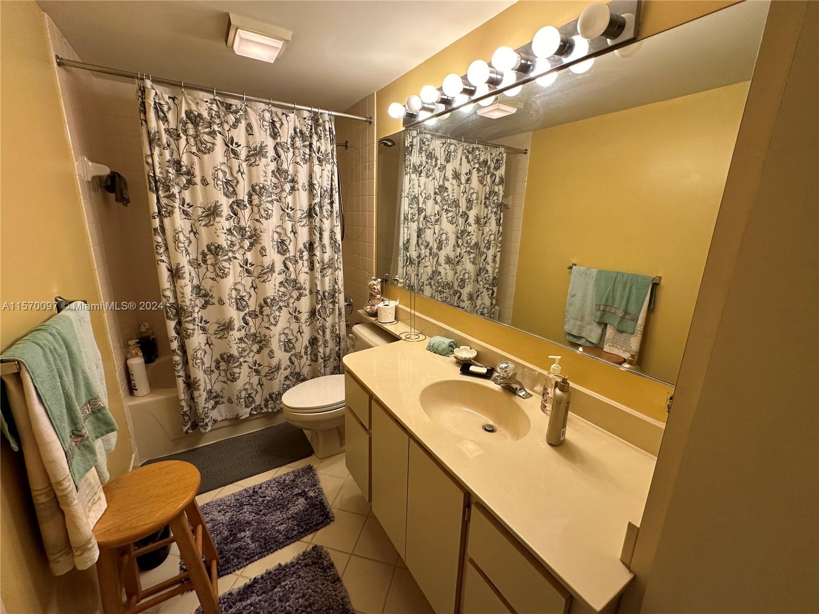 2413 24th Court Jupiter, FL 33477 - Photo 22 of 32 a bathroom with a sink toilet and shower