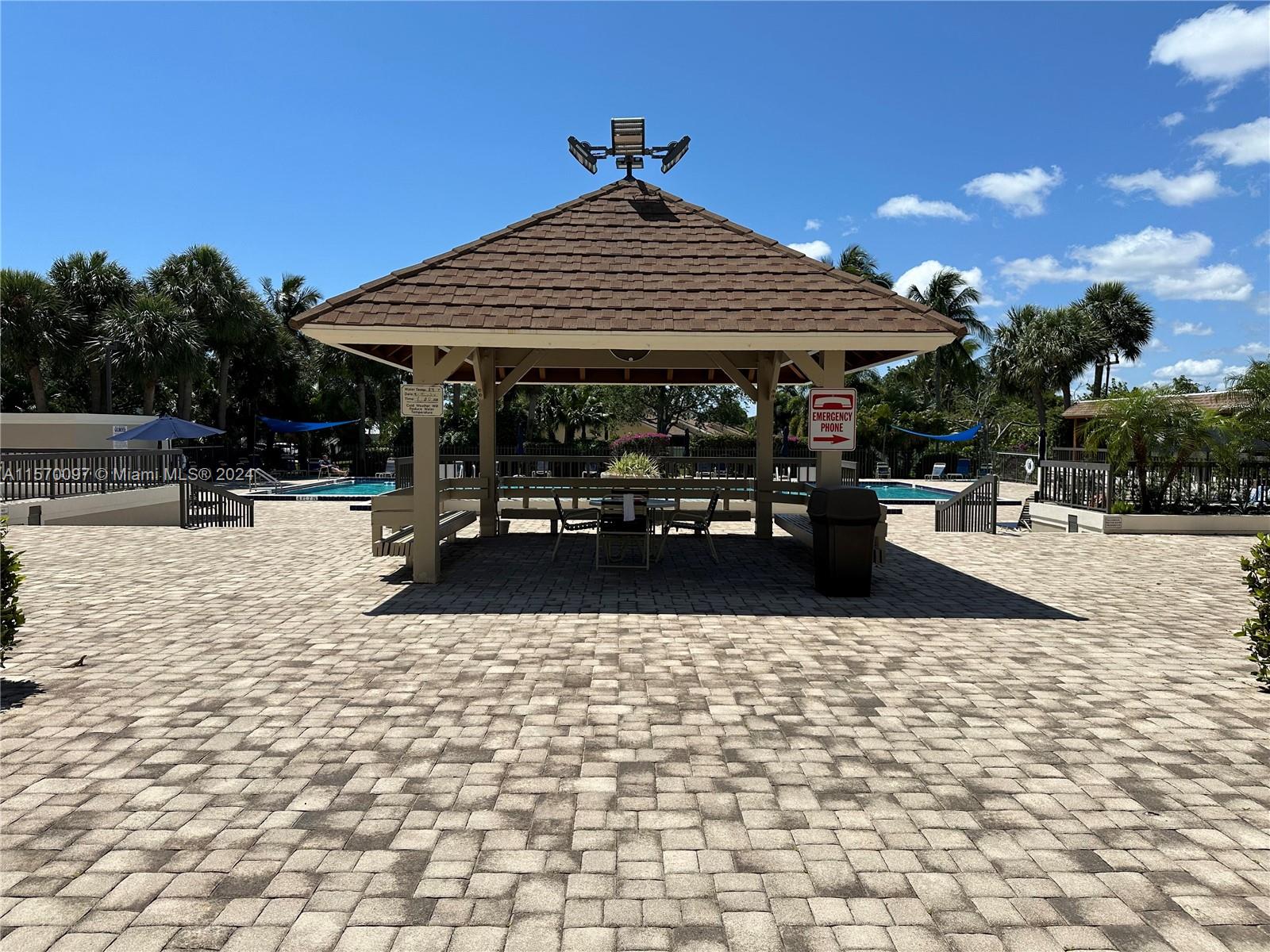 2413 24th Court Jupiter, FL 33477 - Photo 30 of 32 a view of outdoor space with seating area