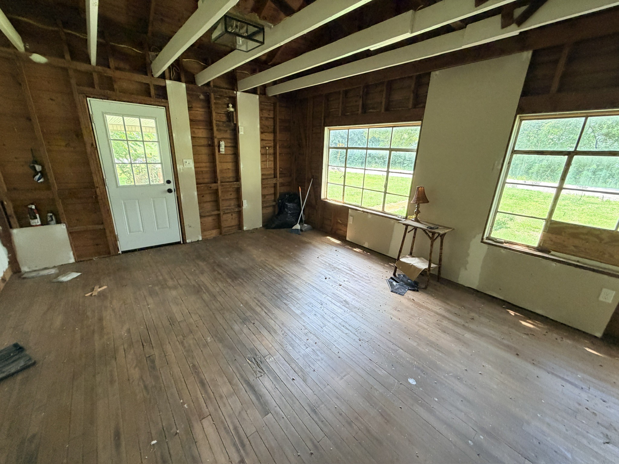 1687 Georgia Crossing Road Winchester, TN 37398 - Photo 29 of 38 wooden floor and windows in an empty room