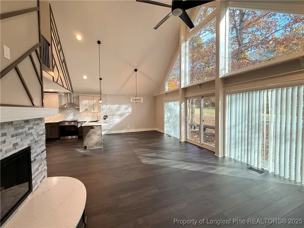 a view of a living room and a fireplace