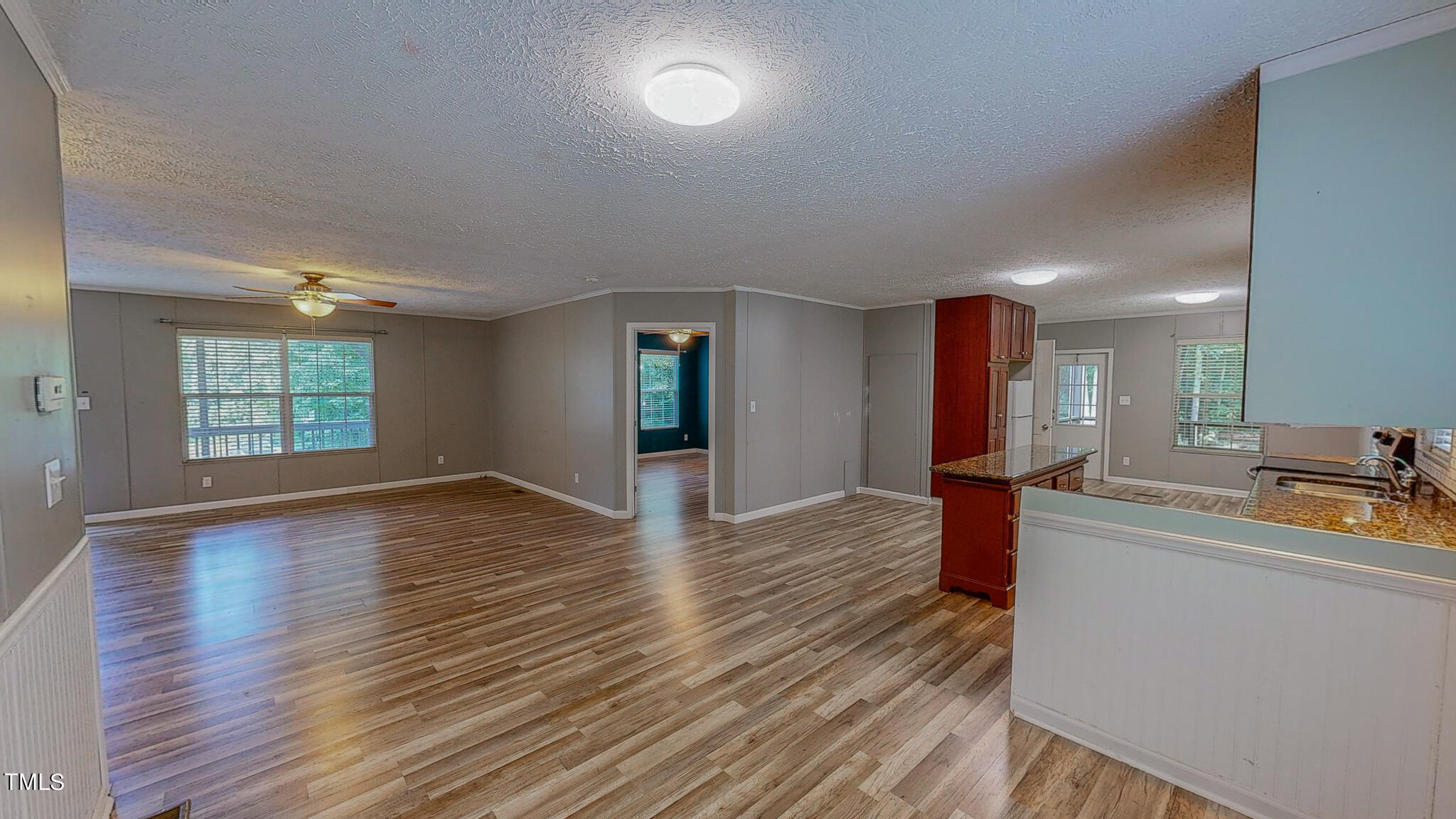 44 Pheasant Way Roxboro, NC 27574 - Photo 16 of 46 a view of a kitchen and wooden floor