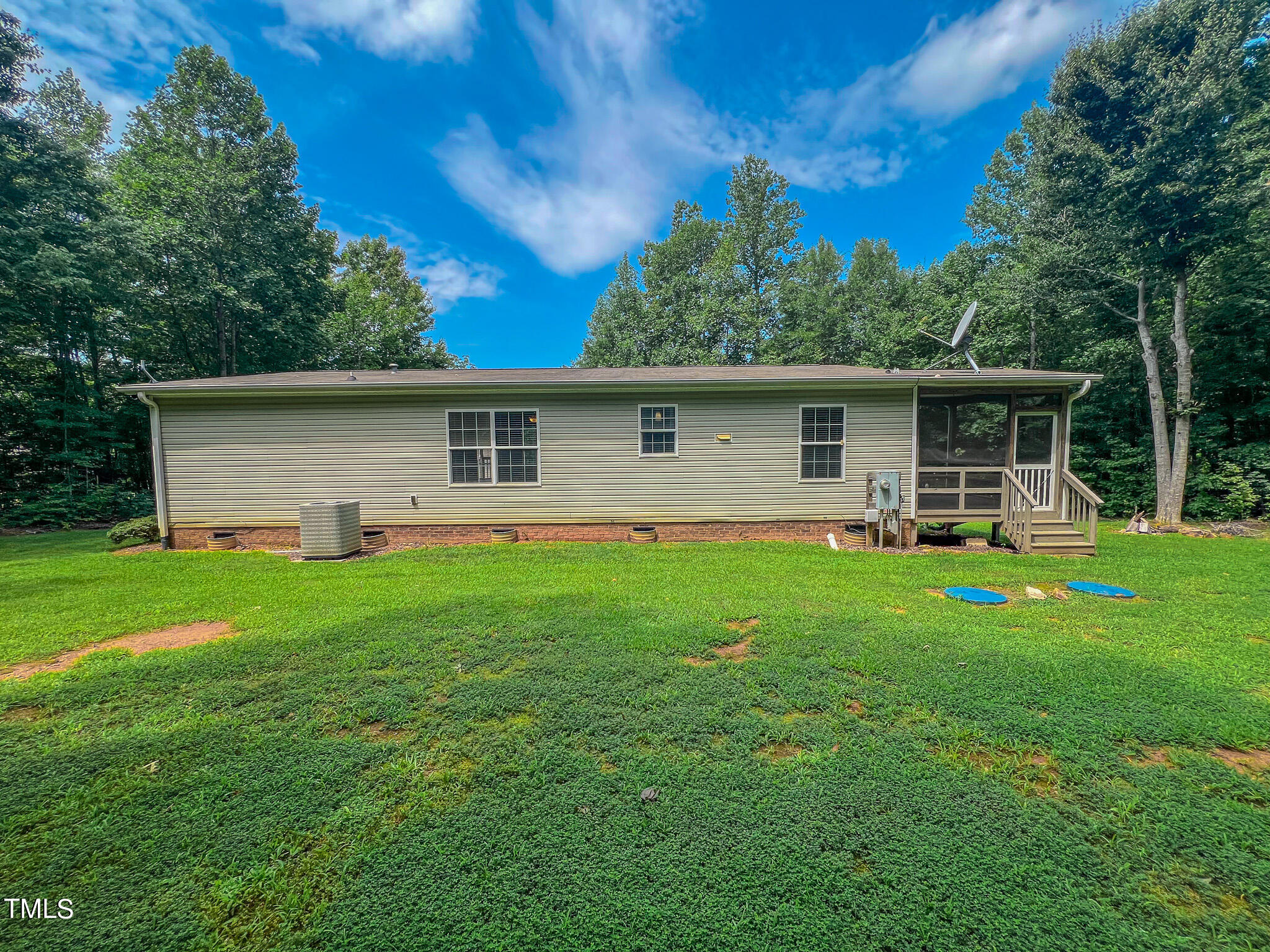 44 Pheasant Way Roxboro, NC 27574 - Photo 24 of 46 a front view of house with yard and green space