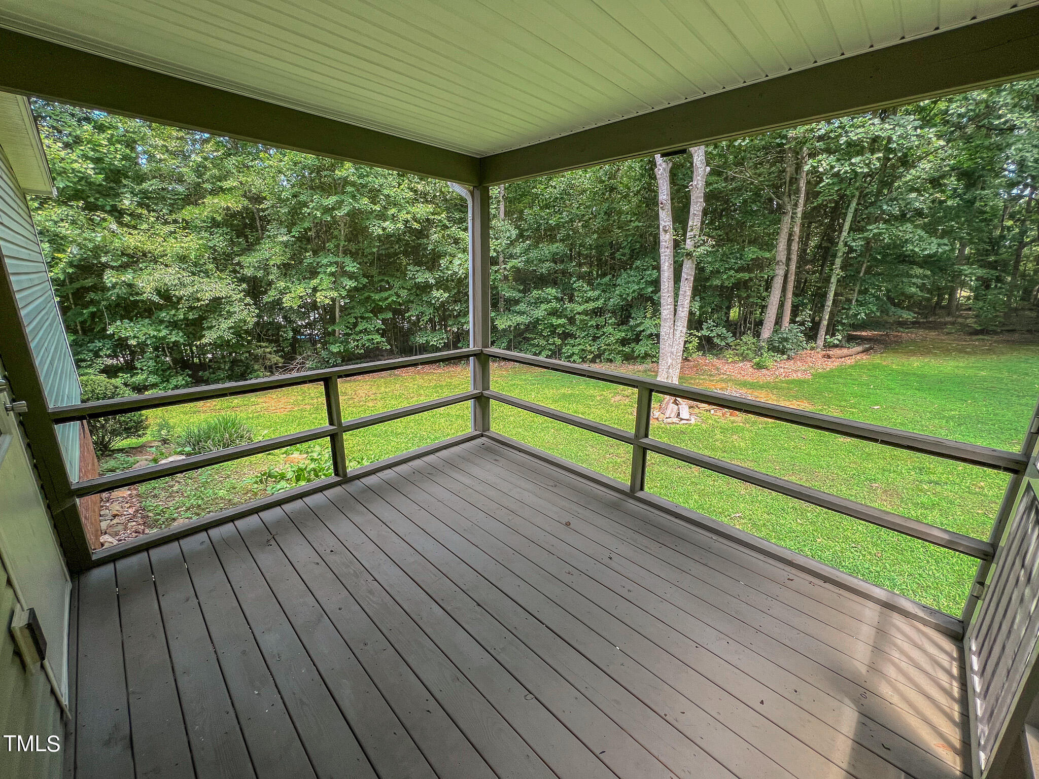 44 Pheasant Way Roxboro, NC 27574 - Photo 25 of 46 a view of a deck with wooden floor and outdoor space