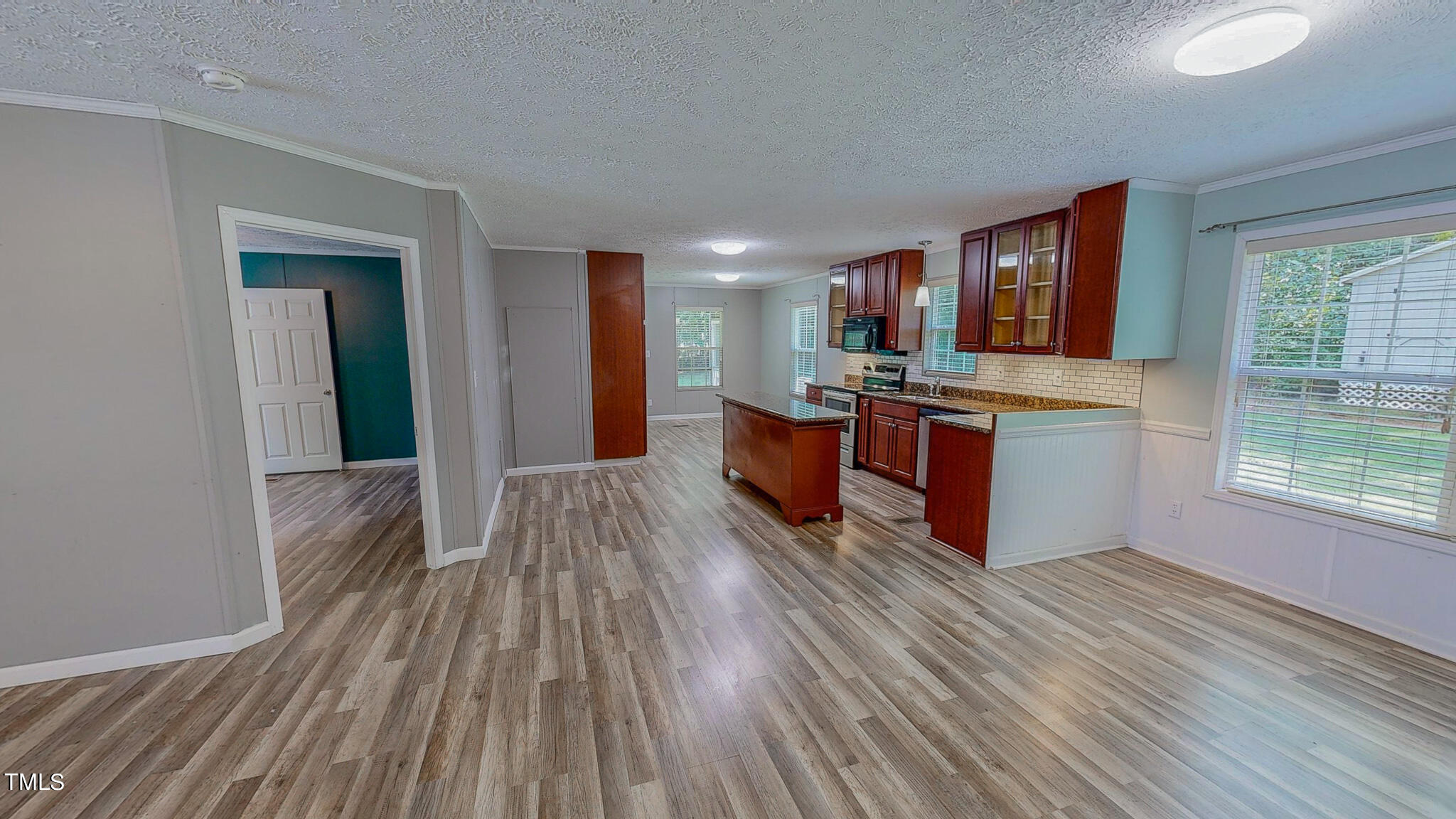 44 Pheasant Way Roxboro, NC 27574 - Photo 30 of 46 a view of kitchen with sink and wooden floor