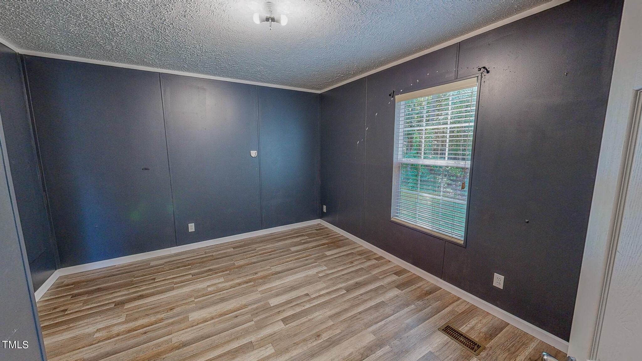 44 Pheasant Way Roxboro, NC 27574 - Photo 36 of 46 a view of an empty room with a window