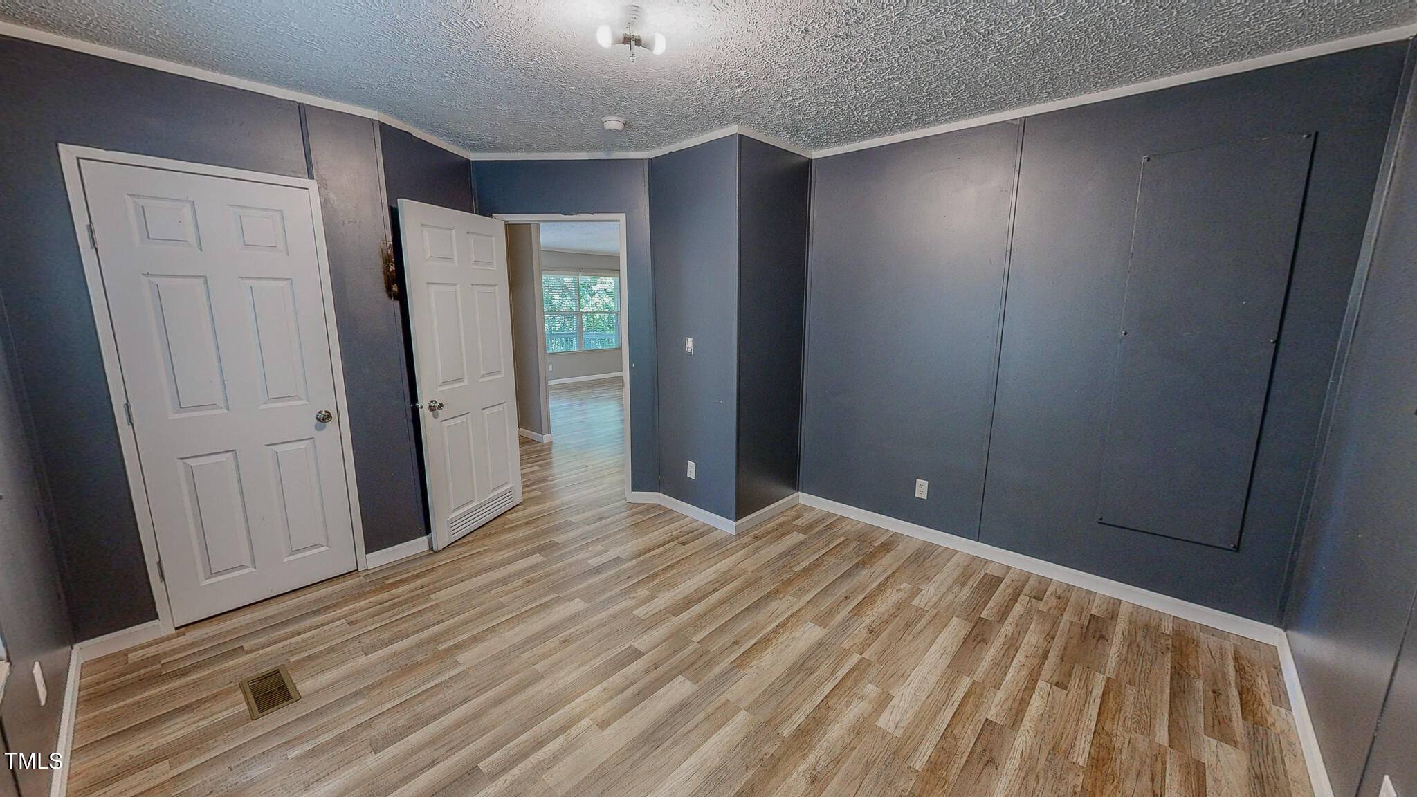 44 Pheasant Way Roxboro, NC 27574 - Photo 37 of 46 a view of empty room with wooden floor