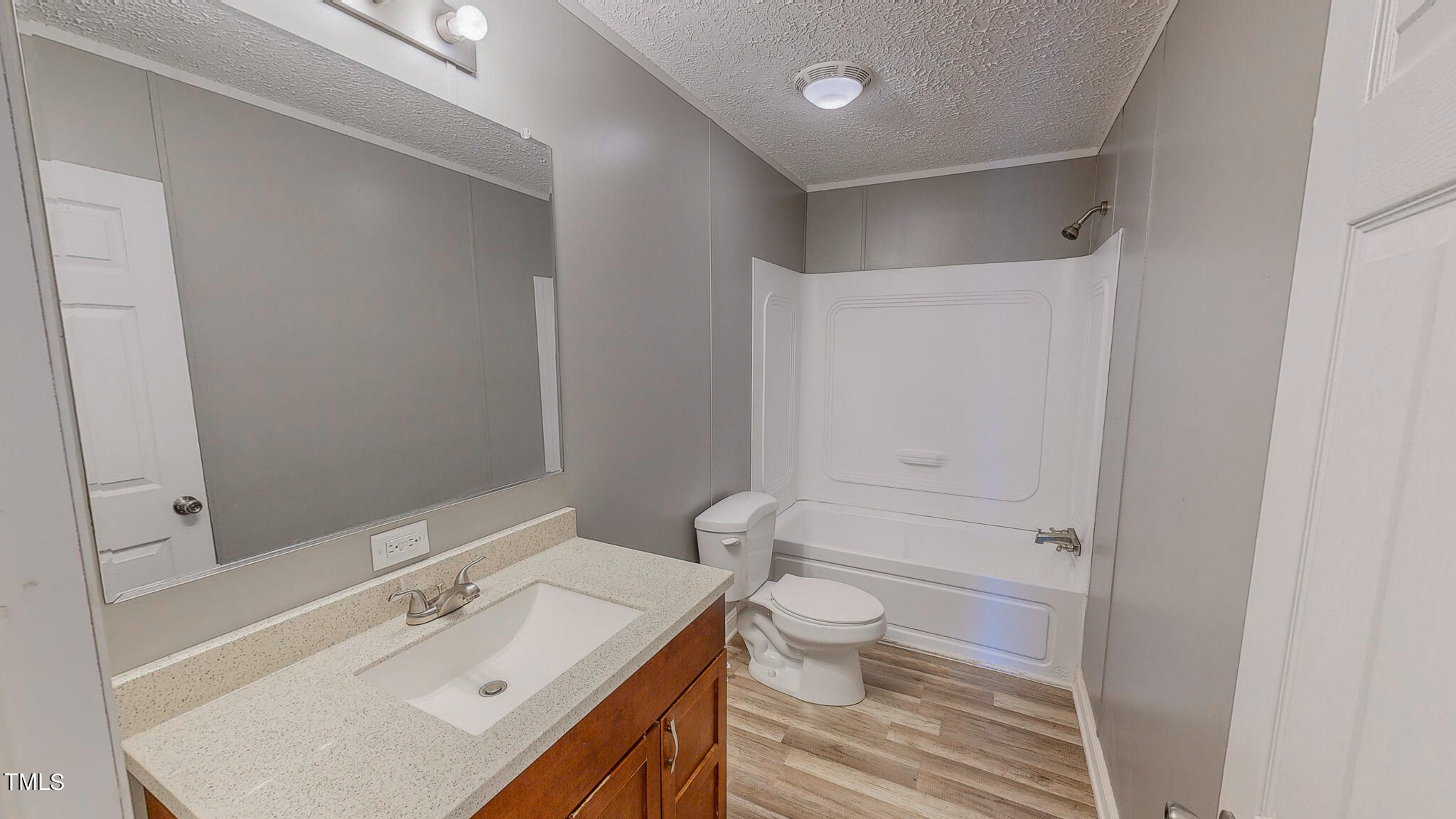 44 Pheasant Way Roxboro, NC 27574 - Photo 39 of 46 a bathroom with a sink toilet and shower