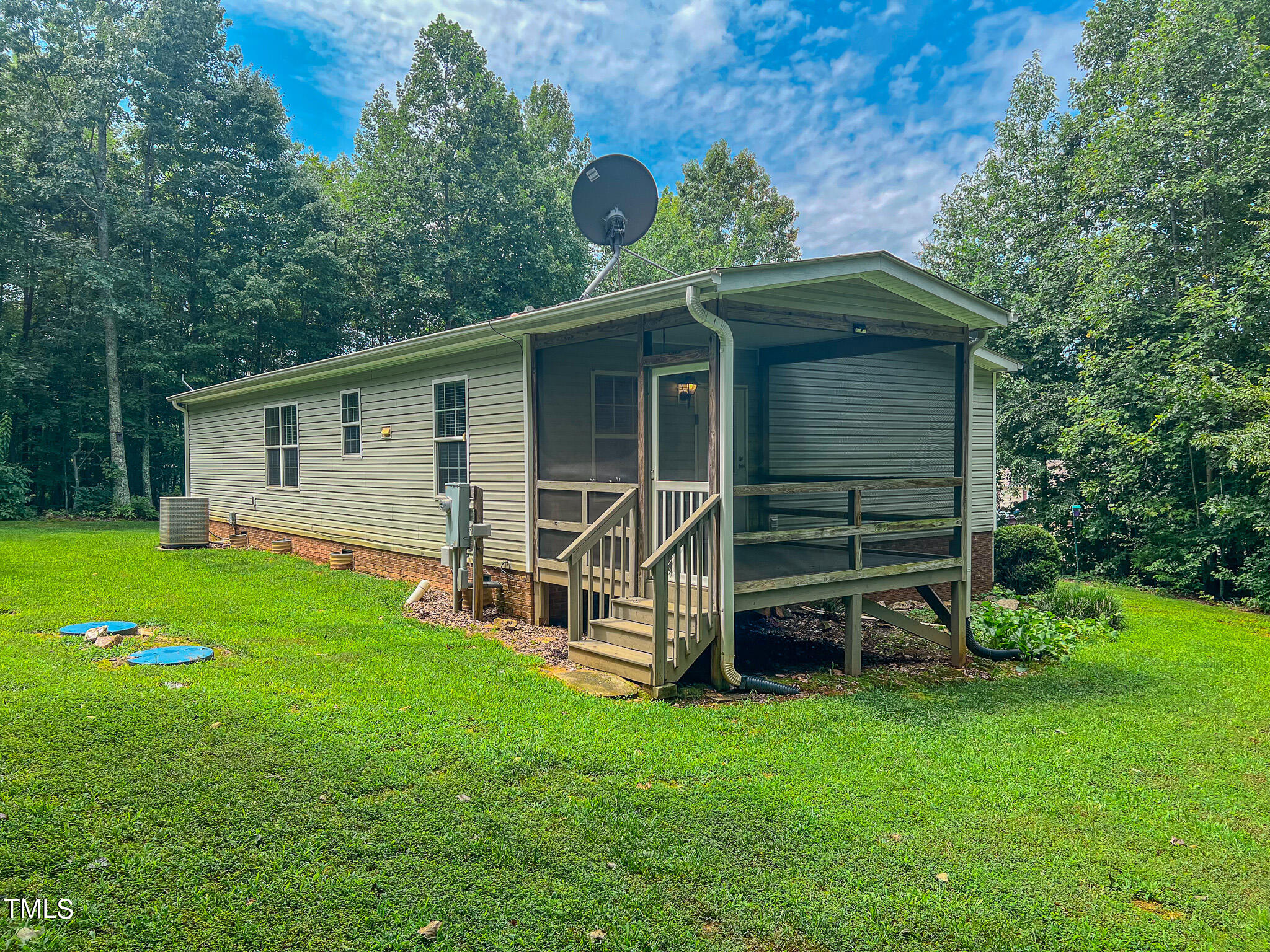 44 Pheasant Way Roxboro, NC 27574 - Photo 46 of 46 a view of a house with a backyard