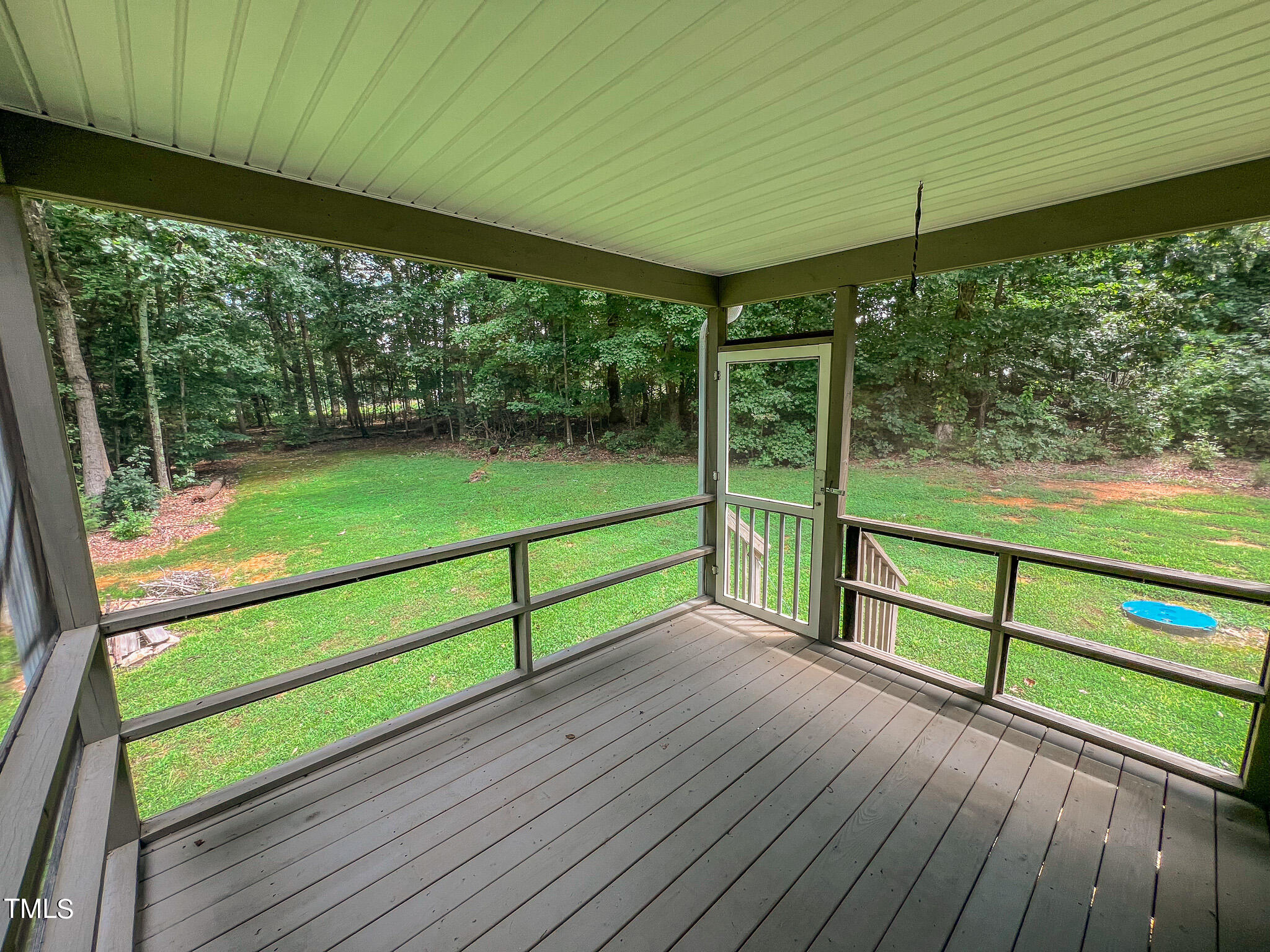 44 Pheasant Way Roxboro, NC 27574 - Photo 6 of 46 a view of a room with wooden floor and outdoor view
