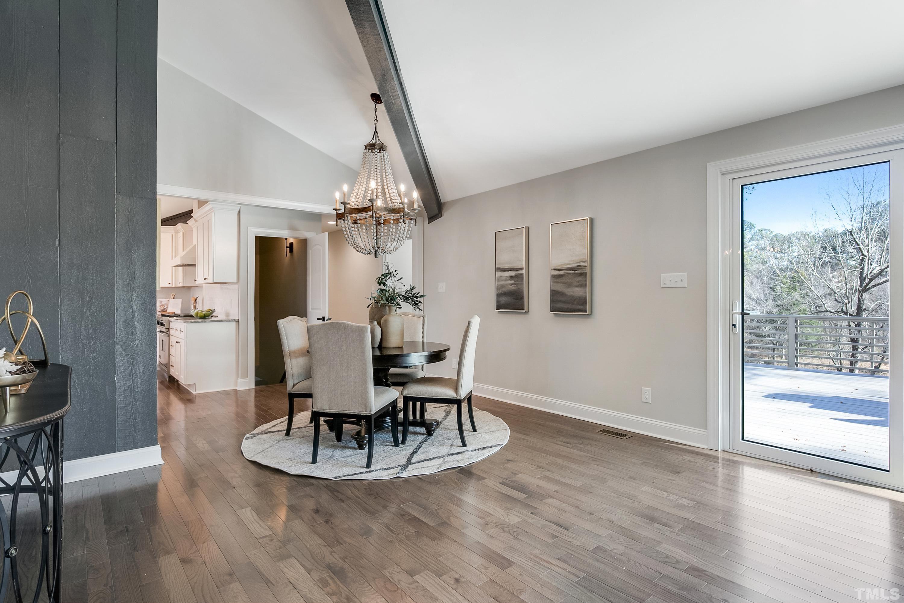 5413 Edington Lane Raleigh, NC 27604 - Photo 11 of 59 a view of a dining room with furniture window and wooden floor