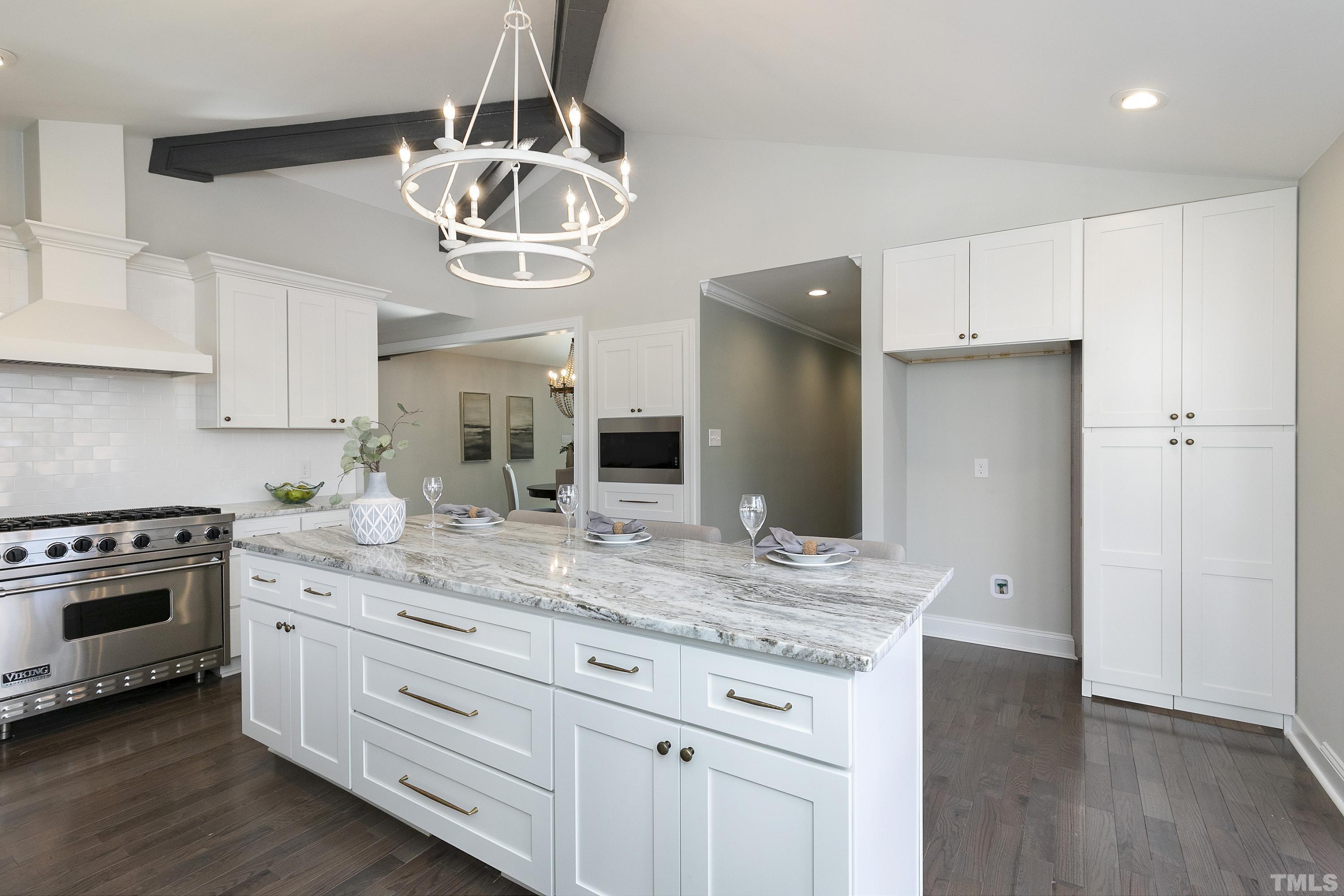 5413 Edington Lane Raleigh, NC 27604 - Photo 12 of 59 a kitchen with a sink and stainless steel appliances