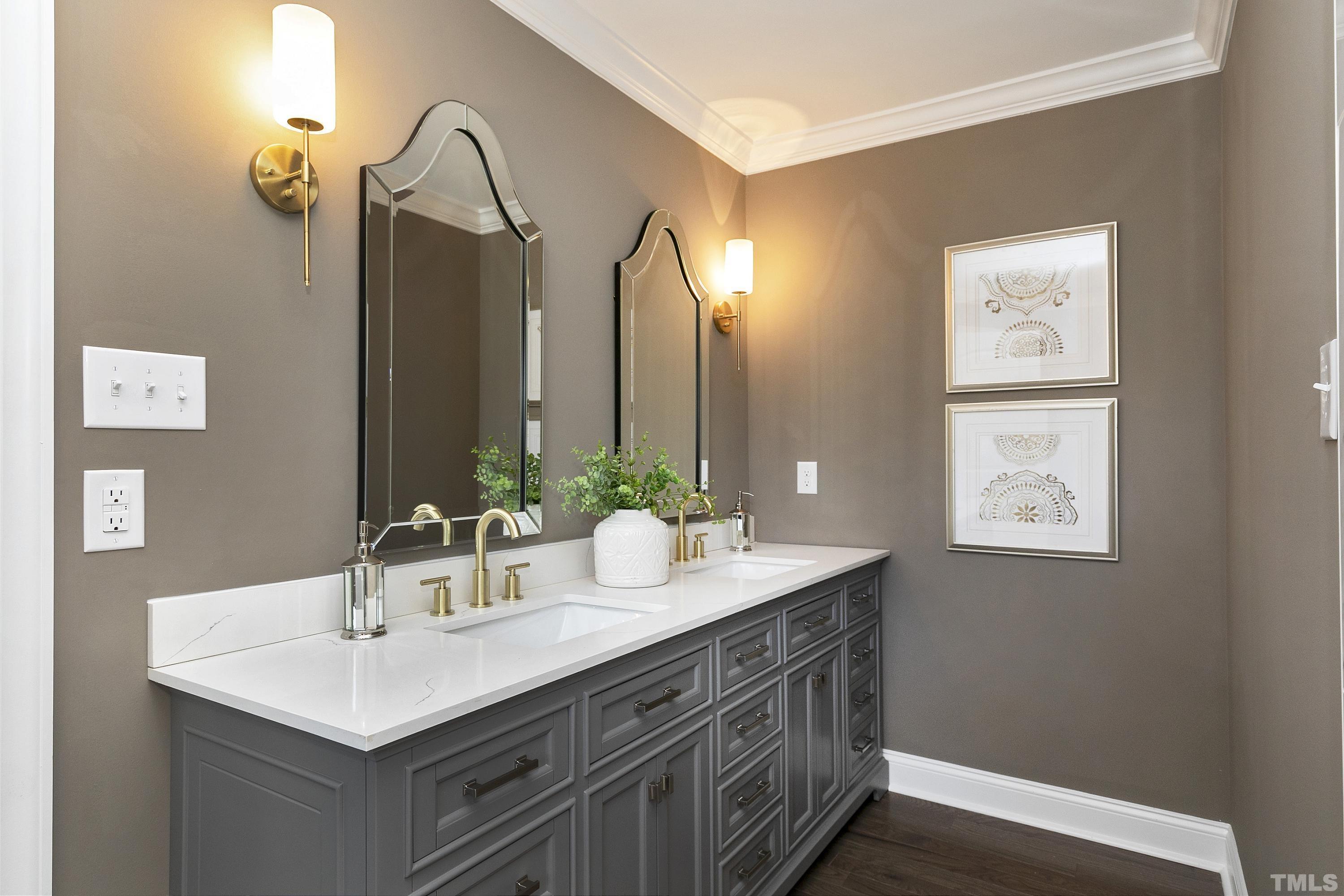 5413 Edington Lane Raleigh, NC 27604 - Photo 23 of 59 a bathroom with a sink and a mirror