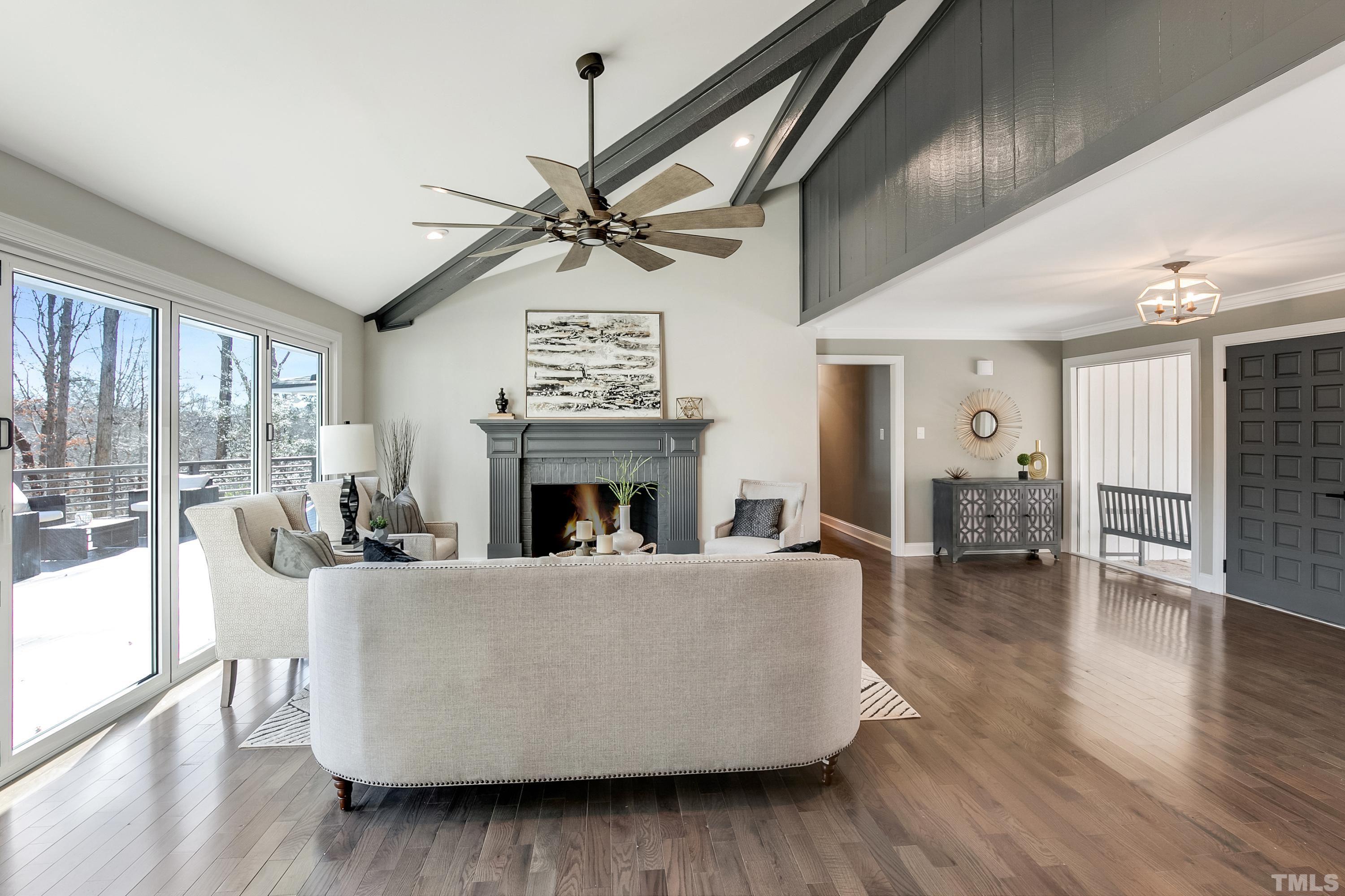 5413 Edington Lane Raleigh, NC 27604 - Photo 27 of 59 a living room with furniture and a fireplace