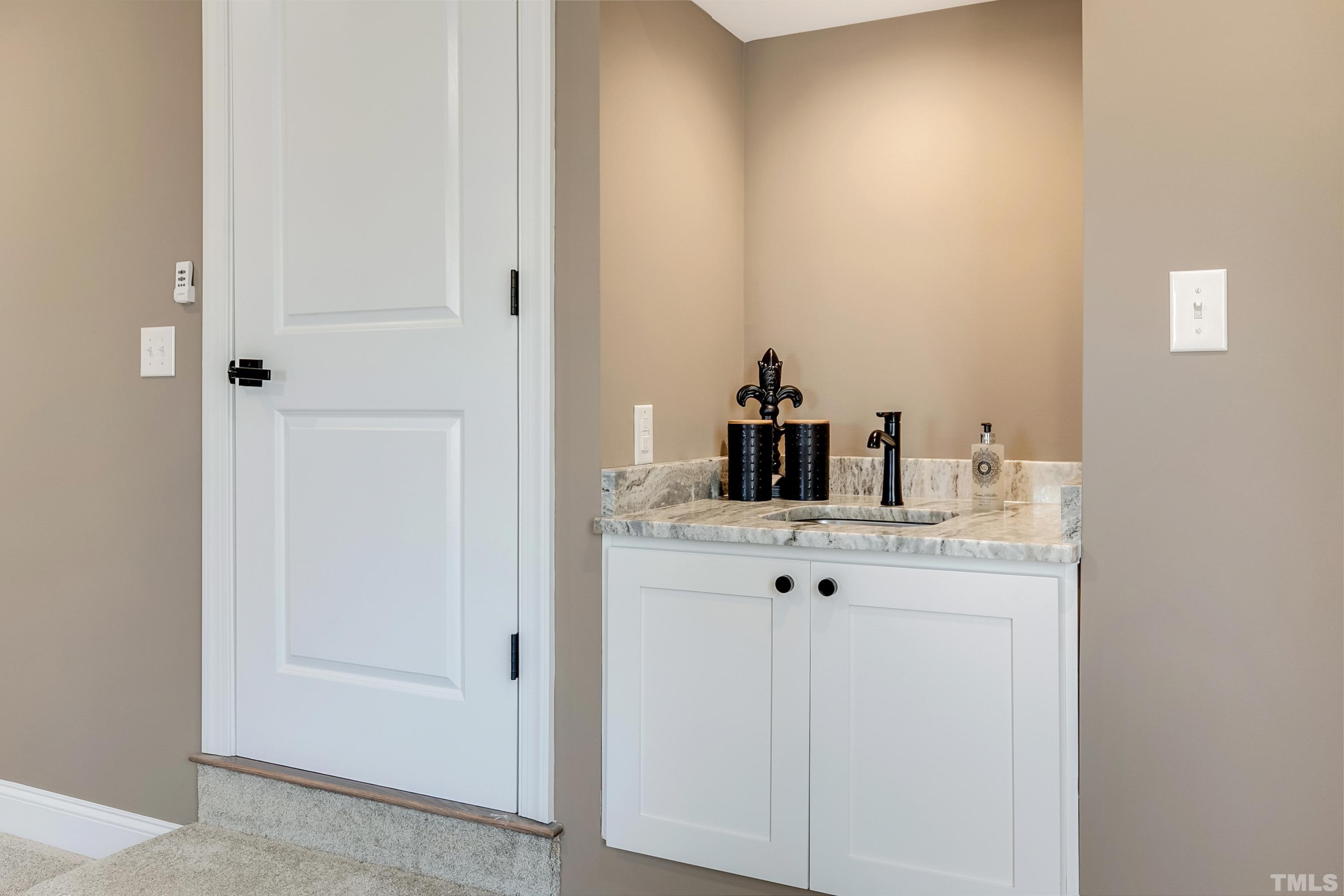 5413 Edington Lane Raleigh, NC 27604 - Photo 30 of 59 a bathroom with a sink and vanity