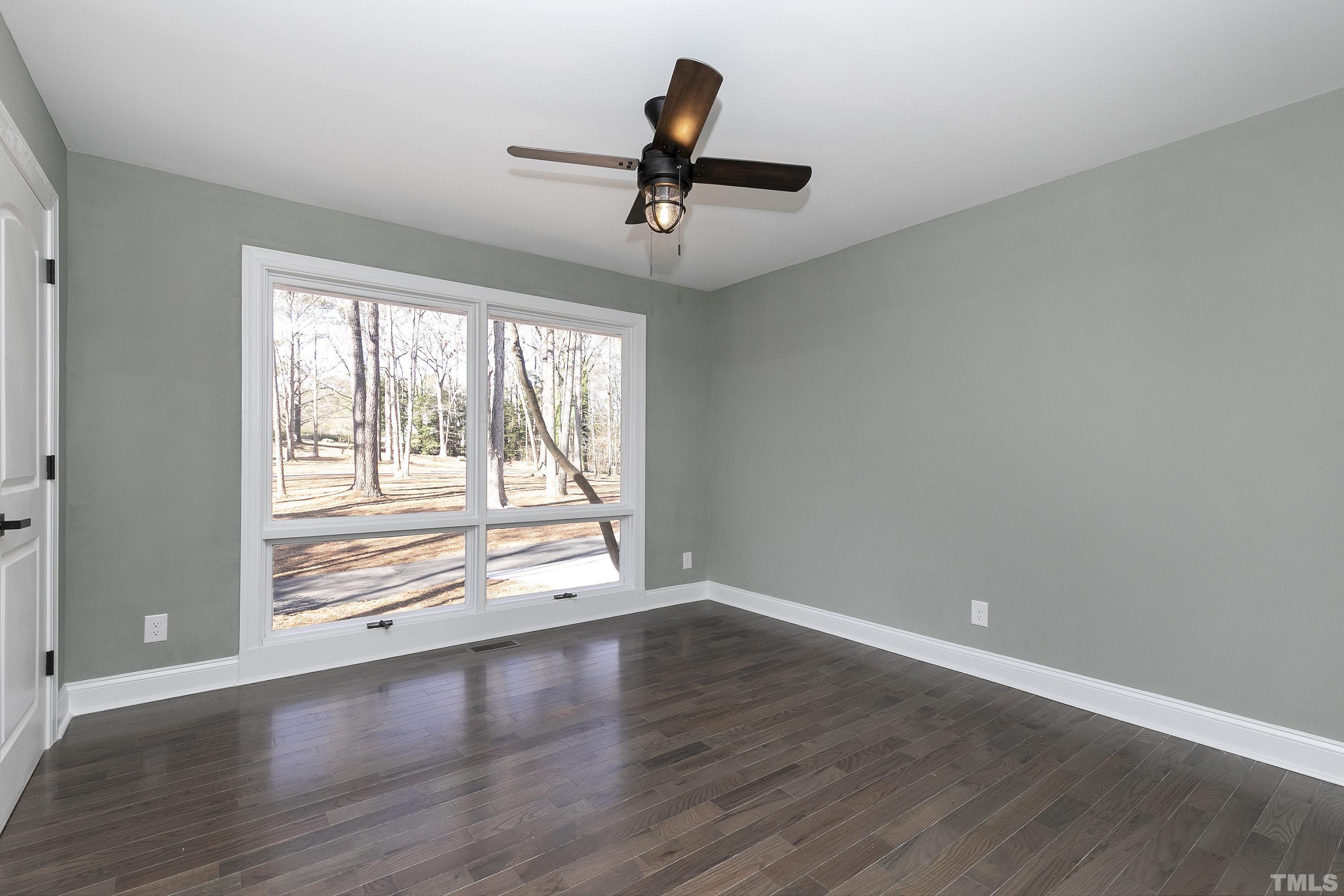 5413 Edington Lane Raleigh, NC 27604 - Photo 31 of 59 wooden floor in an empty room with a window