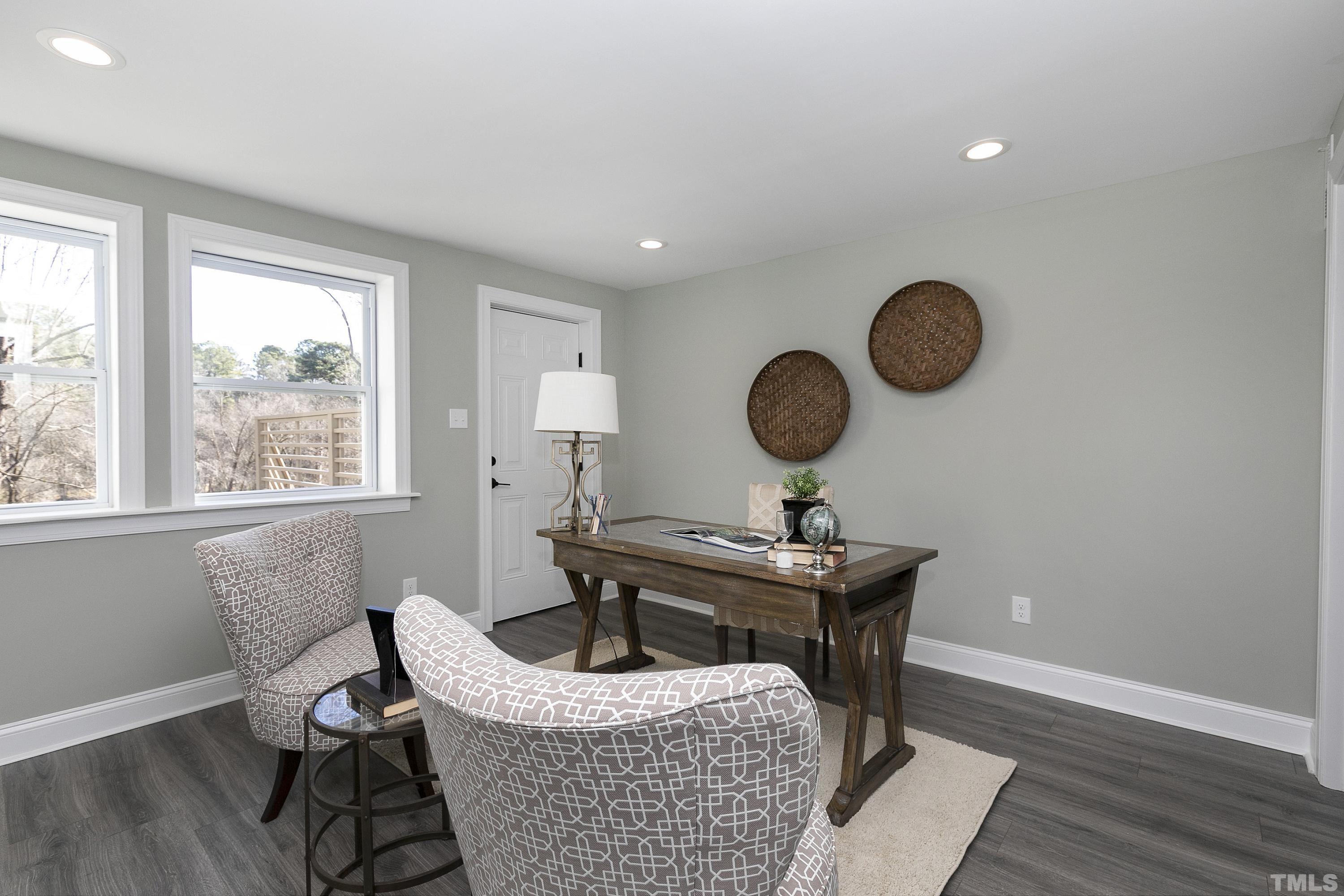 5413 Edington Lane Raleigh, NC 27604 - Photo 33 of 59 a living room with furniture and a window
