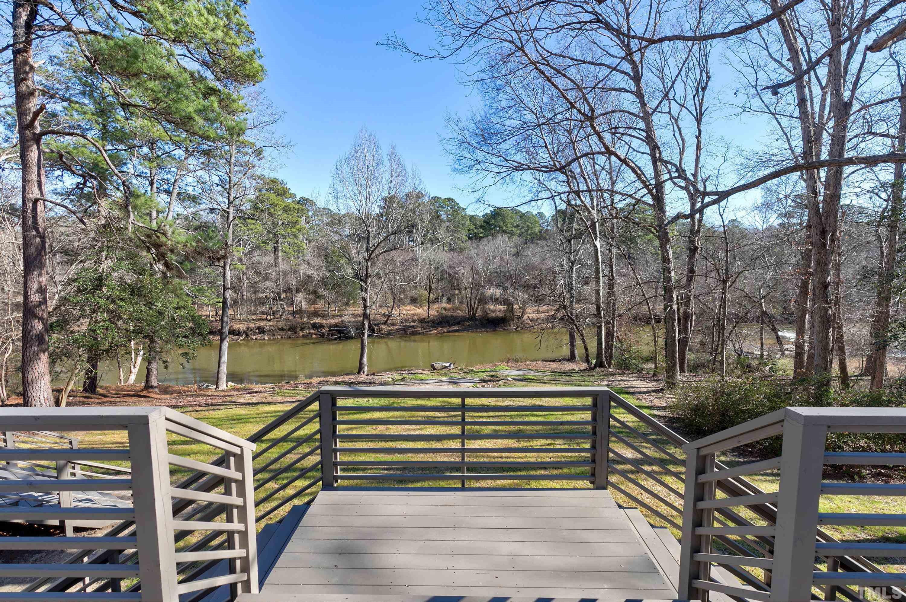 5413 Edington Lane Raleigh, NC 27604 - Photo 41 of 59 a view of a lake with sitting area