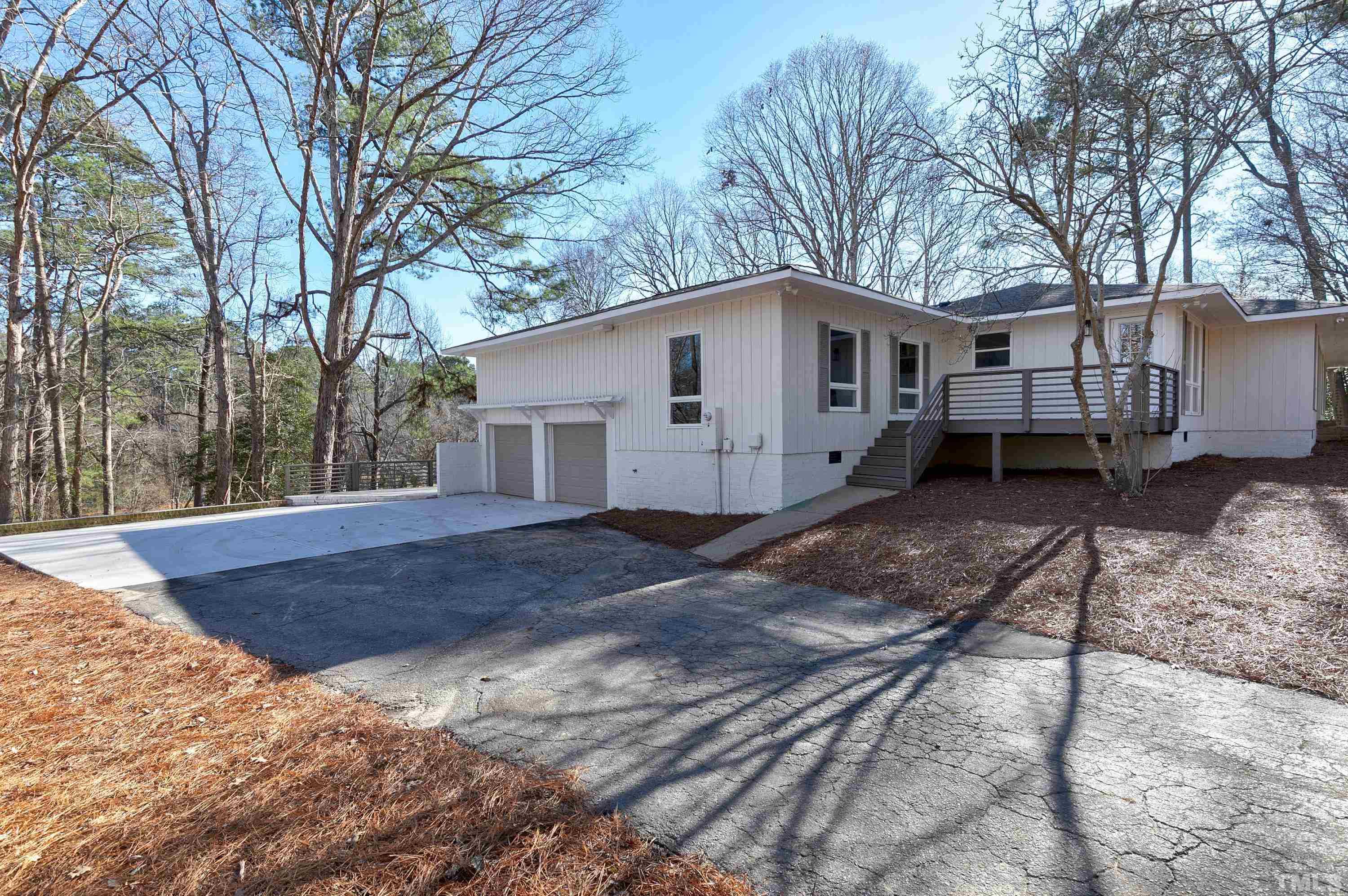 5413 Edington Lane Raleigh, NC 27604 - Photo 46 of 59 a view of a house with a yard covered in snow