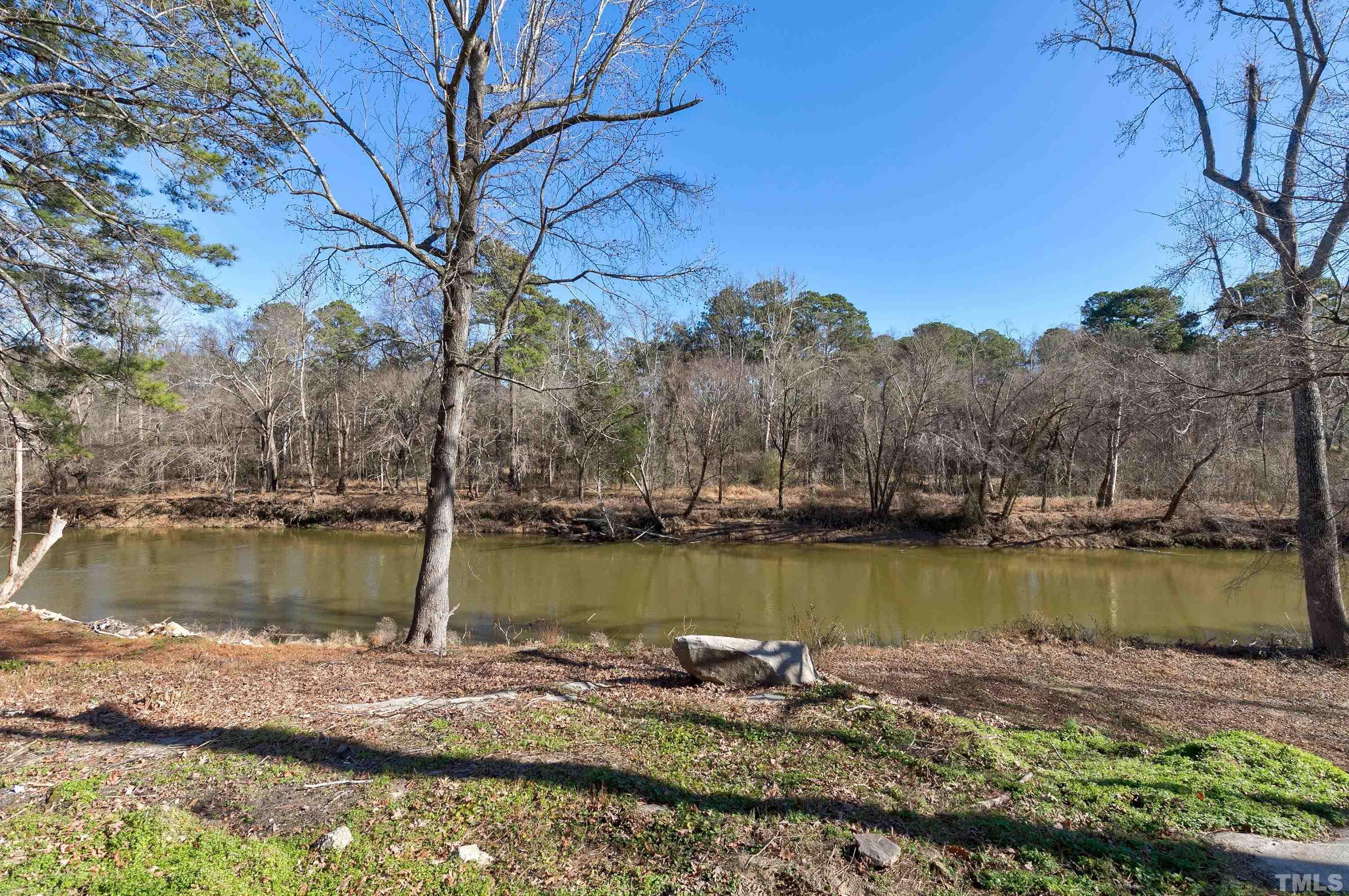 5413 Edington Lane Raleigh, NC 27604 - Photo 50 of 59 a view of a lake with houses