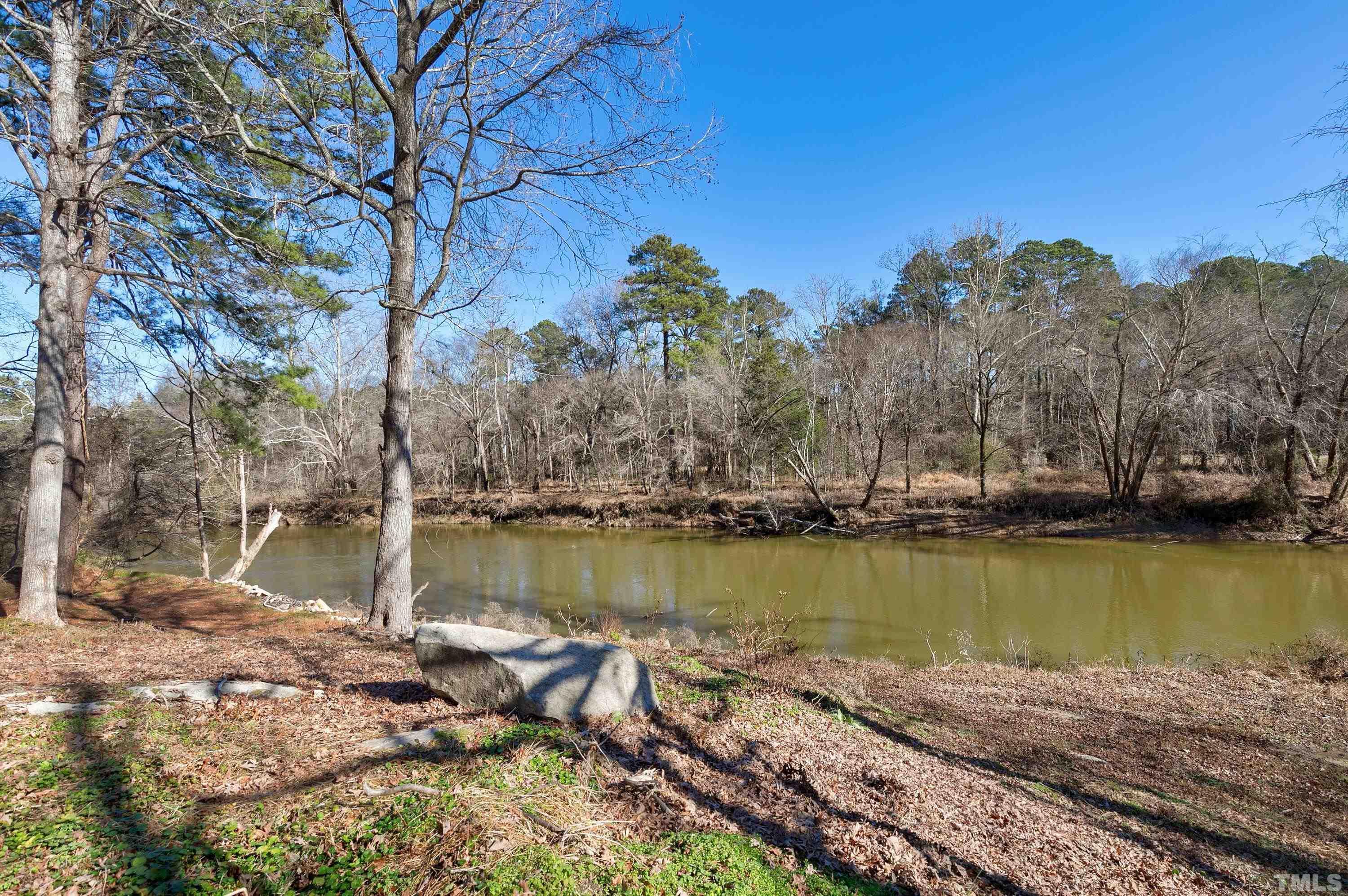 5413 Edington Lane Raleigh, NC 27604 - Photo 52 of 59 a view of a lake with houses