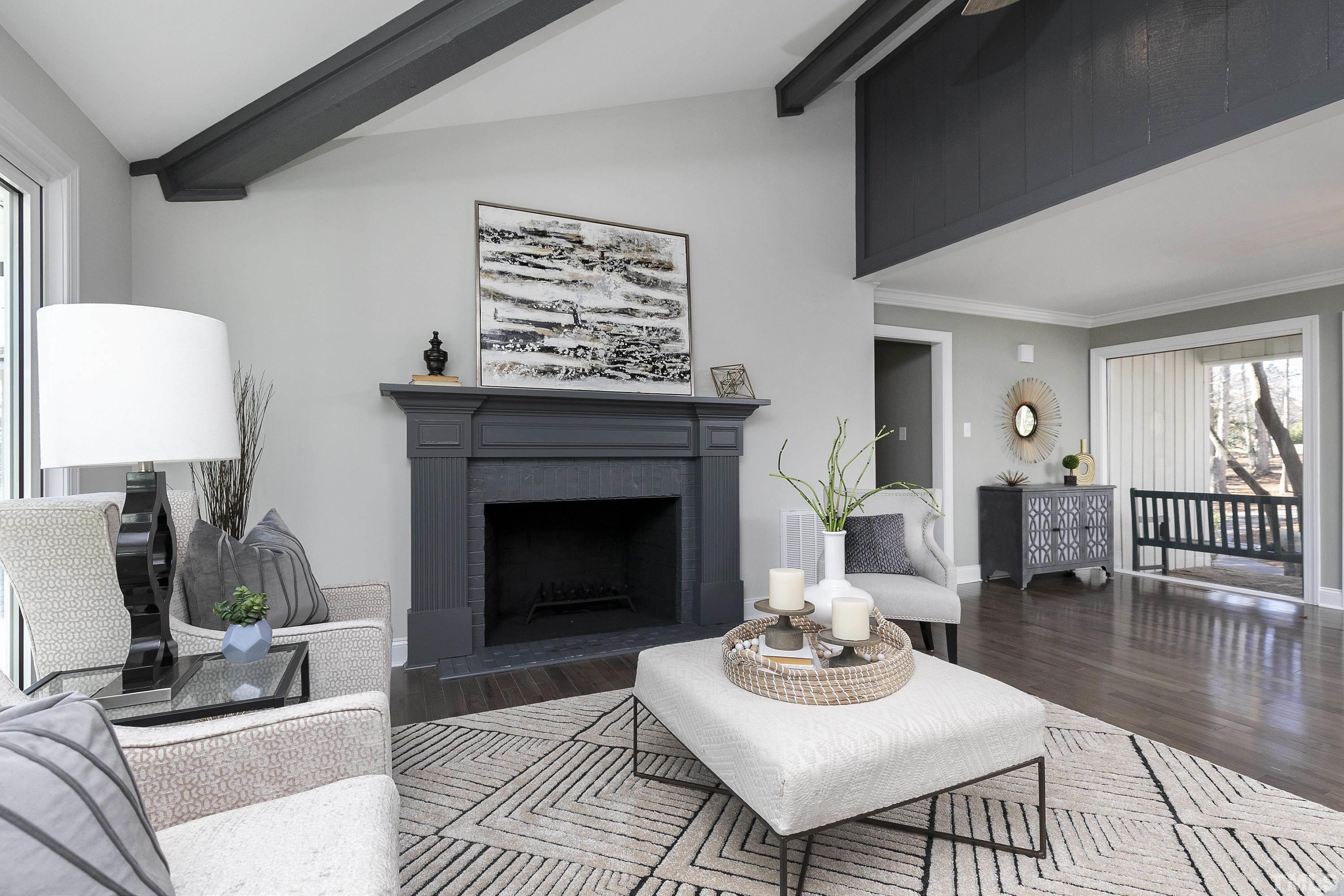 5413 Edington Lane Raleigh, NC 27604 - Photo 7 of 59 a living room with furniture a table and a fireplace