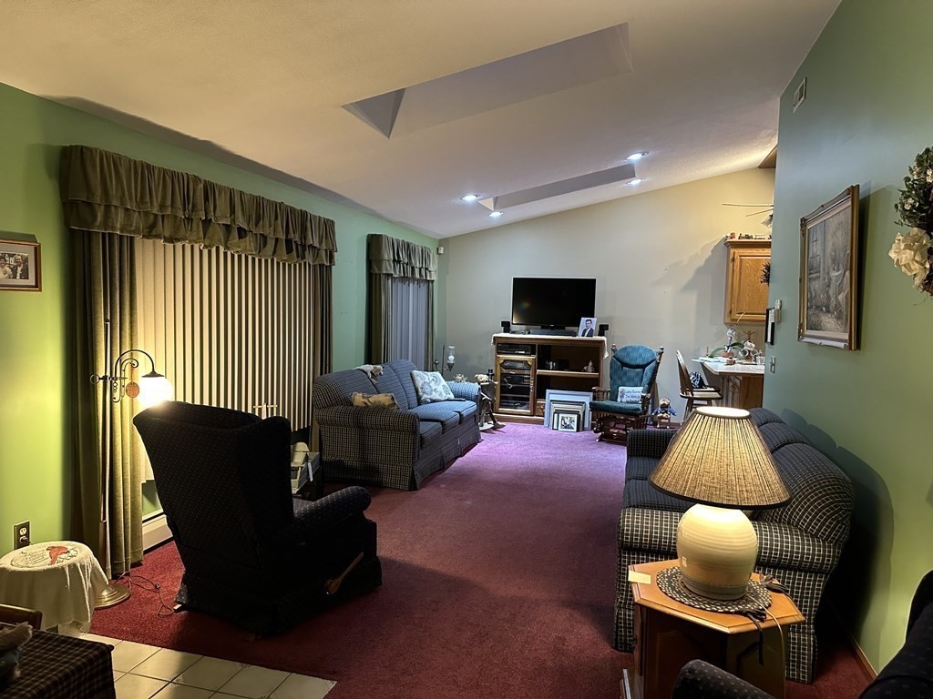 160 Osborne Road Ware, MA 01082 - Photo 6 of 28 a living room with furniture and a flat screen tv