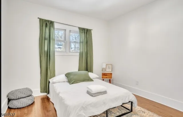 a bedroom with a bed and closet