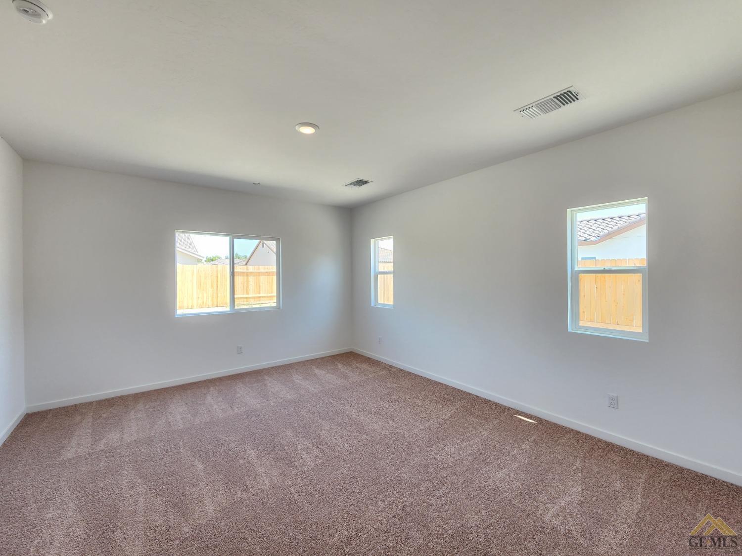 Undisclosed Address Bakersfield, CA 93313 - Photo 10 of 22 an empty room with a window