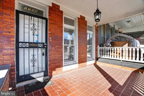a view of a balcony with a potted plant